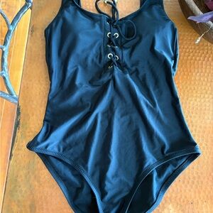 Mossimo Supply Co. Black lace up swimsuit one piece. Very good condition.